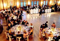Elegant banquet hall with dining guests.